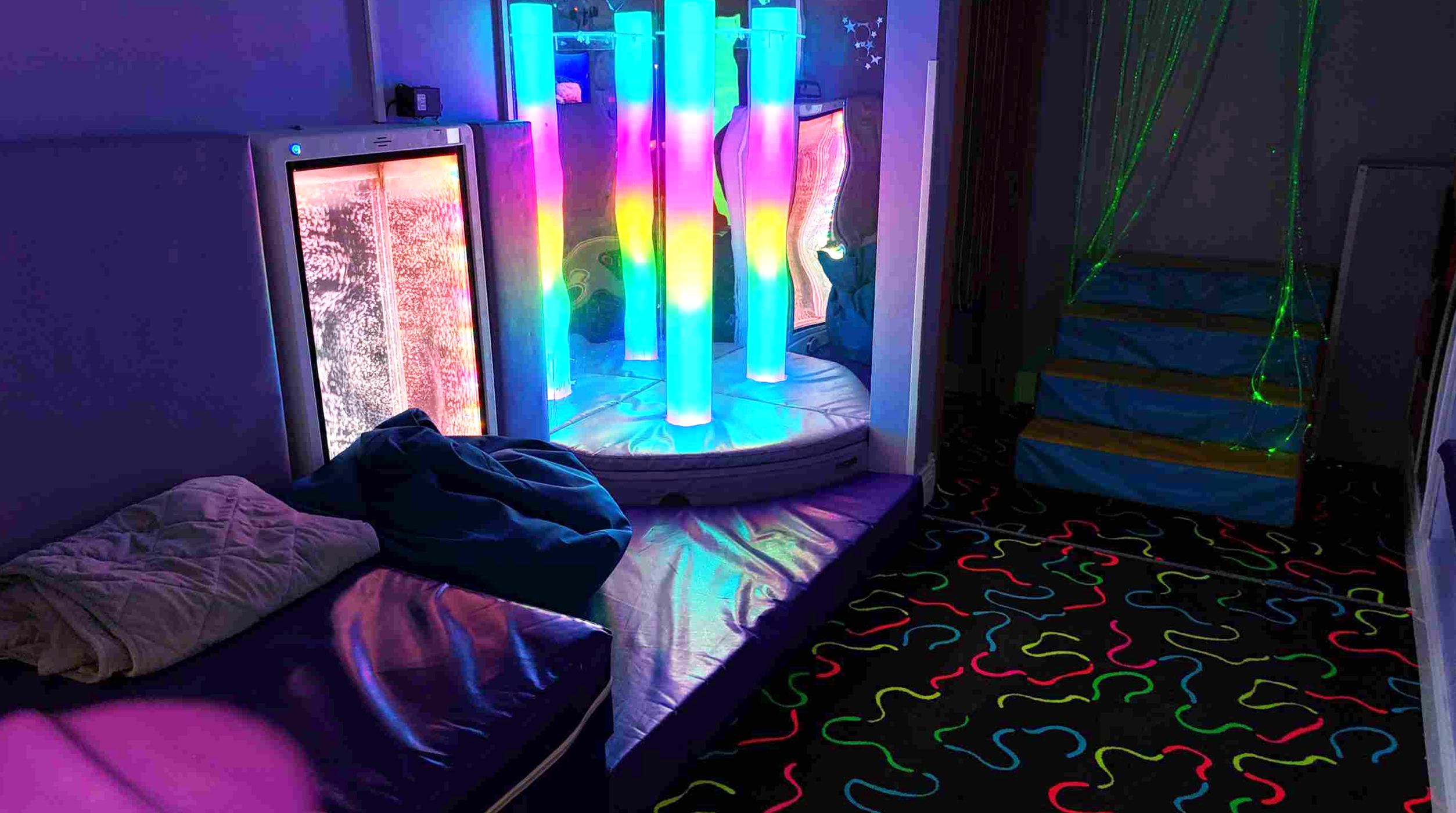 Lighting tubes with all different colours and padded floors
